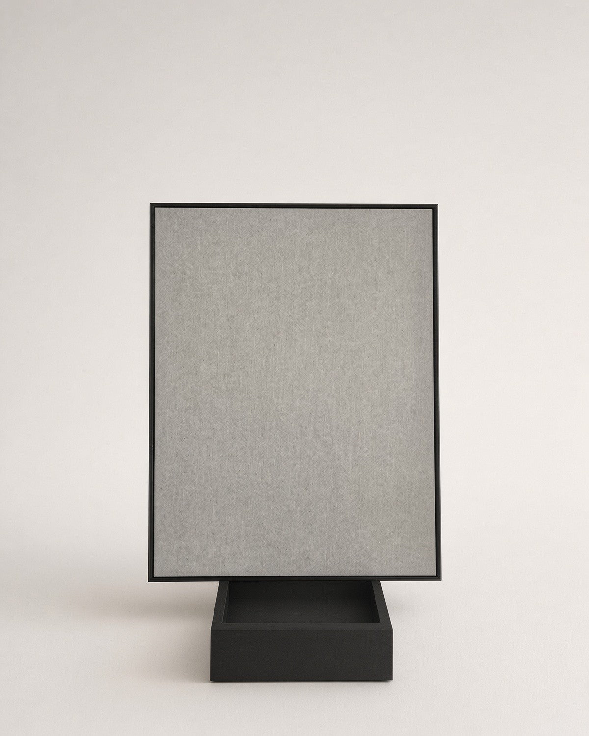 Front view of the board standing in portrait in its black stand