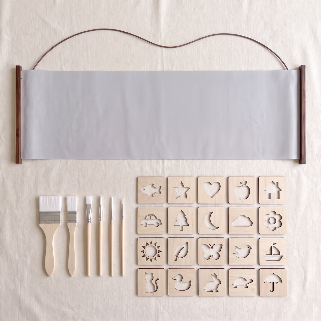 The Water Canvas part of the set laid flat: the long grey canvas on dark wooden rods with its cord, six wooden-handled brushes and twenty wooden stencils